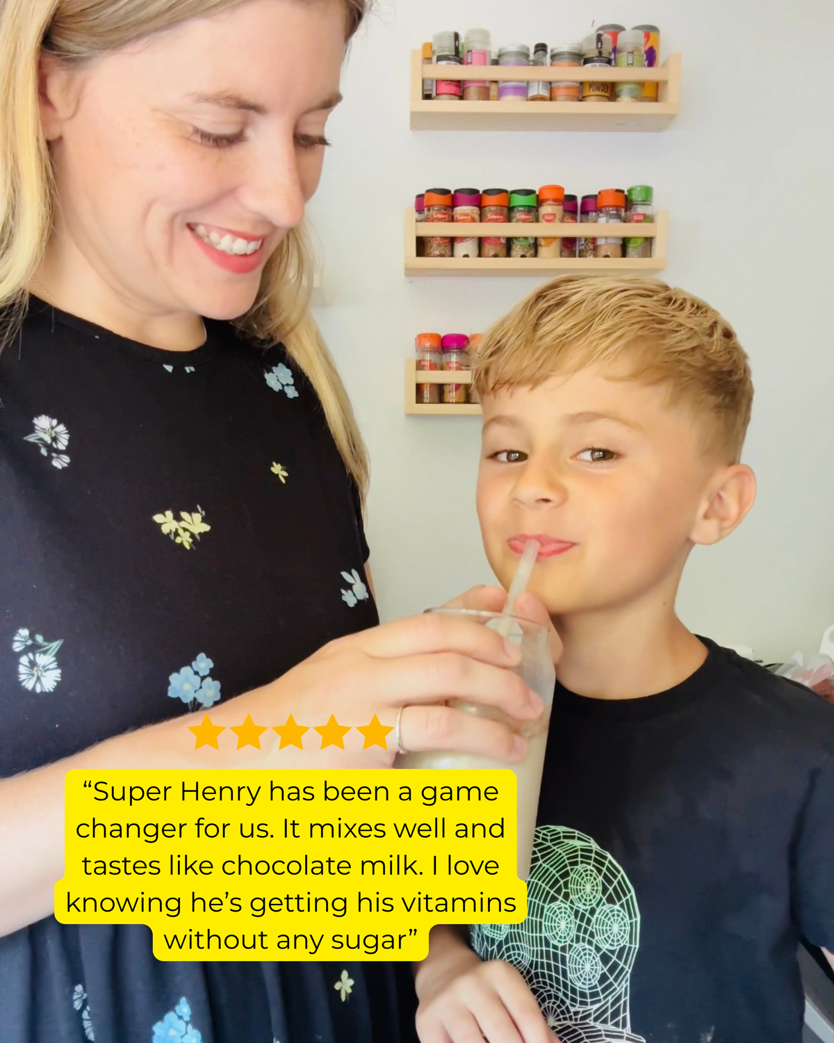 Mum watching her child enjoy Super Henry chocolate greens mixed into milk.